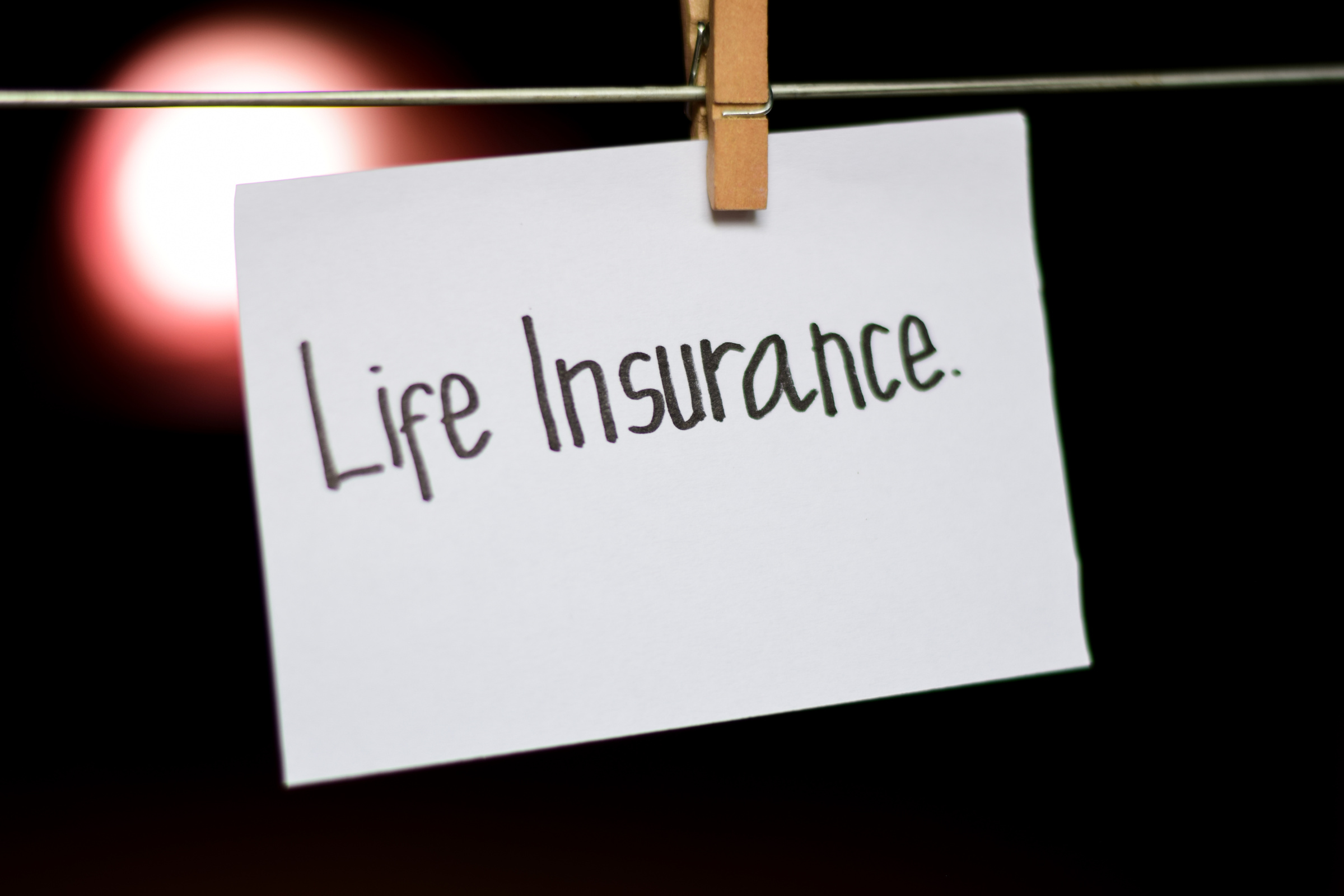 Life Insurance handwriting on paper.